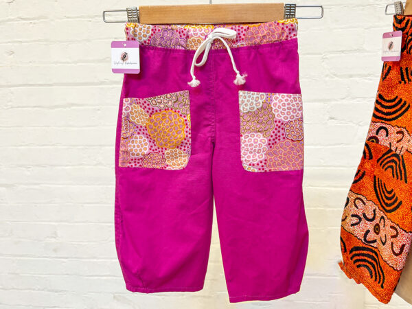 Kids Pink pants with flower pockets by The Laughing Kookaburra