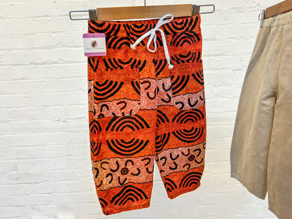 Kids Orange pants with pockets by The Laughing Kookaburra