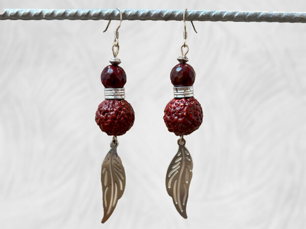 Painted Quandong and leaf earrings by Dja Yingila