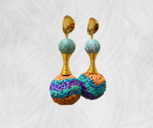 Painted quandong with turquoise glass bead earrings by Dja Yingila