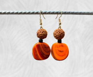 Natural Quandong & orange swirl earrings by Dja Yingila