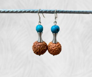 Blue seed and quandong earrings by Dja Yingila